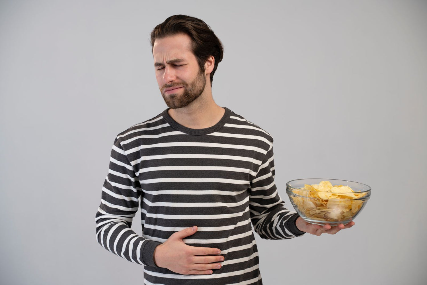 person with eating disorder having belly pain