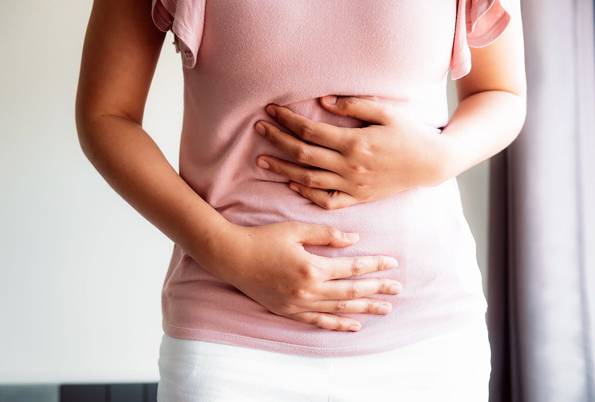 female suffering from gas issue